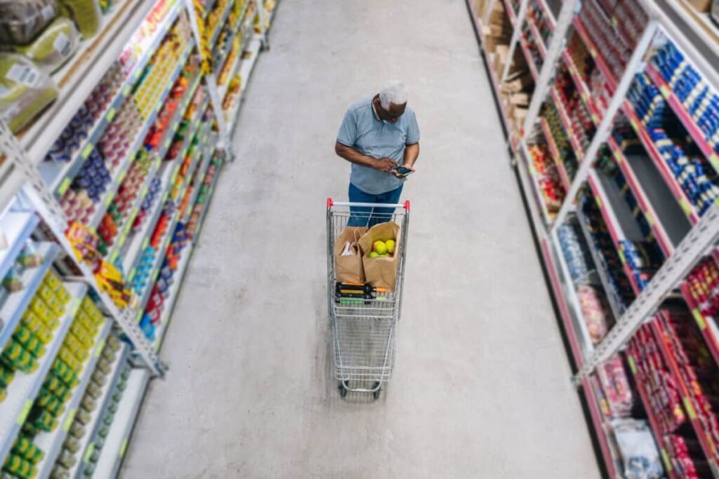 I Can’t Get Enough of Canada’s Biggest REIT (and Its 5.3% Yield) man shops at grocery store